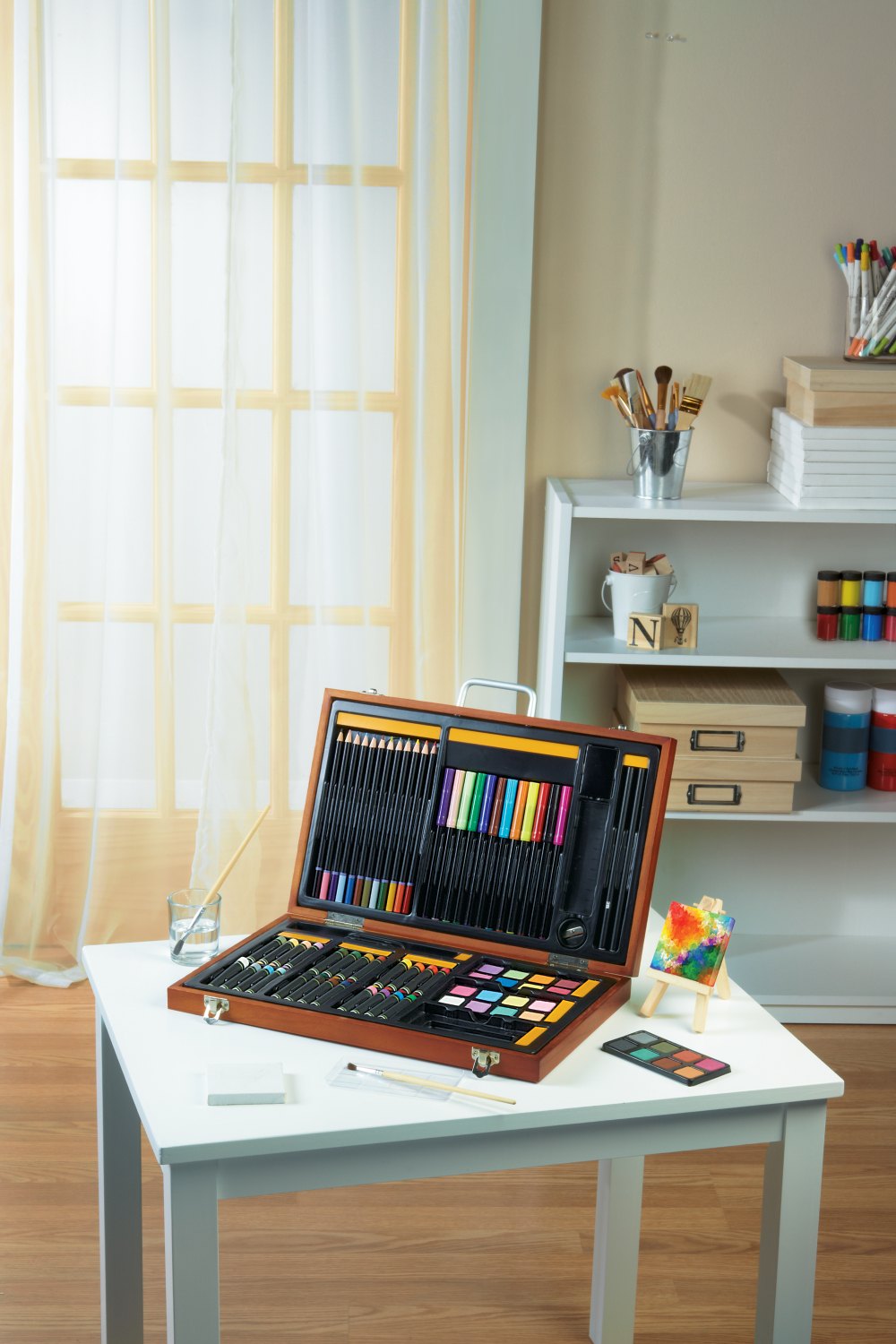 Creatology art case open on a bright desk